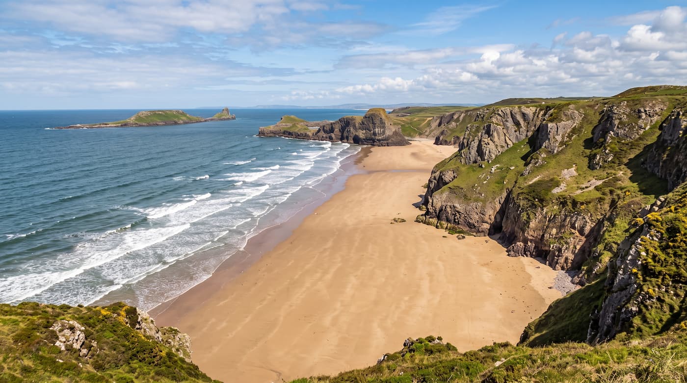 Rhossili Bay beach and dramatic coastal cliffs on the Gower Peninsula